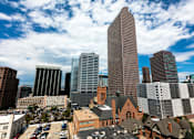 Thumbnail 34 of 35 - an aerial view of the city with tall buildings and skyscrapers