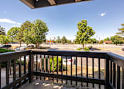 Thumbnail 26 of 33 - the view from the deck of a building overlooking a parking lot