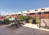 Thumbnail 28 of 35 - our apartments have a patio with a picnic table and grill