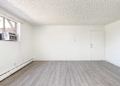 Thumbnail 11 of 35 - Vacant model living room area