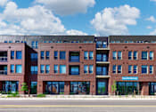 Thumbnail 28 of 29 - A large brick building with the words