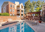 Thumbnail 34 of 50 - our apartments have a pool and a patio with chairs