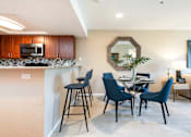Thumbnail 16 of 50 - our apartments at the district feature a dining area and kitchen
