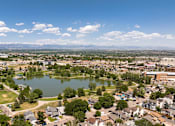 Thumbnail 37 of 39 - an aerial view of a lake in the middle of a city
