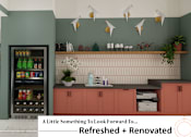 Thumbnail 5 of 34 - A cafe with a vending machine and a counter.