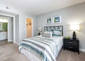 Thumbnail 21 of 42 - Tampa Pet Friendly Apartments at Arbour Ponds Aspen bedroom angle 2x2 950 sq ft