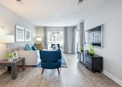 Thumbnail 16 of 42 - Tampa Pet Friendly Apartments at Arbour Ponds Aspen living room view 2x2 950 sq ft