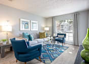 Thumbnail 17 of 42 - Tampa Pet Friendly Apartments at Arbour Ponds Aspen living room 2x2 950 sq ft