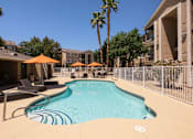 Thumbnail 20 of 43 - our apartments have a resort style pool with chairs and umbrellas