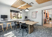 Thumbnail 35 of 43 - a conference room with a table and chairs and a large window