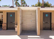 Thumbnail 22 of 43 - two urinals in a handicapped bathroom at a parking lot