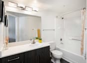 Thumbnail 10 of 87 - the preserve at ballantyne commons apartments bathroom with tub and sink
