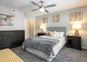 Thumbnail 7 of 87 - the preserve at ballantyne commons bedroom with bed and ceiling fan