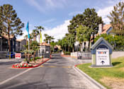 Thumbnail 82 of 87 - an empty street with a sign for a lease office at the end of a road