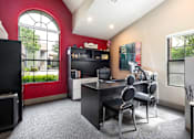 Thumbnail 87 of 87 - a home office with a desk and chairs and a large window