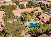 Thumbnail 26 of 43 - a mansion with a swimming pool in the middle of trees