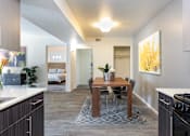 Thumbnail 6 of 43 - our apartments at the district feature a kitchen and dining room