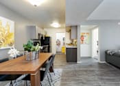 Thumbnail 20 of 43 - the living room and dining room of an apartment