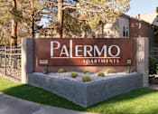 Thumbnail 1 of 43 - a sign for palermo apartments in front of a fence