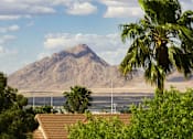 Thumbnail 54 of 54 - a view of a mountain and the ocean from a roof