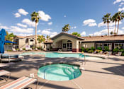 Thumbnail 41 of 54 - our resort style pool is surrounded by chairs and palm trees