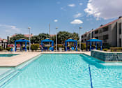 Thumbnail 16 of 36 - our apartments have a large swimming pool with blue cabanas