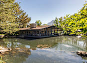 Thumbnail 33 of 42 - the pond and the boat house at the pavilion