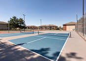 Thumbnail 32 of 38 - two tennis courts at the whispering winds apartments in pearland