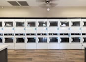 Thumbnail 37 of 38 - the laundry room is full of white cabinets and appliances