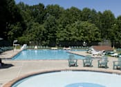 Thumbnail 23 of 30 - Two sparkling pools with poolside lounge at Troy Hills Village in Parsippany, NJ,07054