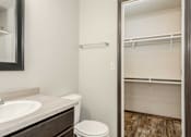 Thumbnail 9 of 12 - Bathroom with sink and toilet at Beal Townhomes Apartments, Sioux Falls, 57108