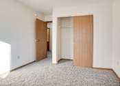 Thumbnail 7 of 8 - Bedroom with Closet at Dock 9 Apartments, Fargo, 58103