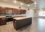Thumbnail 3 of 15 - Kitchen at Mezzo Apartments, North Dakota