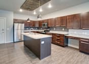 Thumbnail 1 of 15 - Kitchen at Mezzo Apartments, Fargo, ND