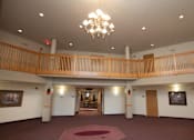 Thumbnail 3 of 8 - a large room with a balcony and a chandelier