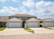 Thumbnail 1 of 9 - Garages at Courtyard Townhomes, Moorhead, MN