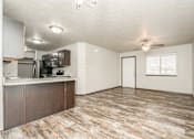Thumbnail 2 of 11 - Open Living and Kitchen at Graystone Townhomes,, Sioux Falls, SD