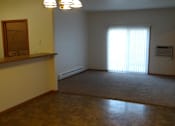 Thumbnail 6 of 9 - Unfurnished Living Room at Courtyard Townhomes, Minnesota, 56560