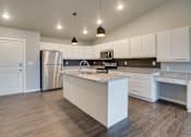 Thumbnail 2 of 15 - Kitchen at Mezzo Apartments, North Dakota