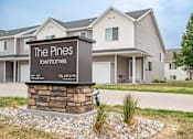 Thumbnail 1 of 13 - Property Signage at The Pines Townhomes, Fargo
