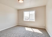 Thumbnail 11 of 13 - Carpeted Bedroom at The Pines Townhomes, North Dakota, 58104
