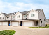 Thumbnail 2 of 13 - Garages Available at The Pines Townhomes, North Dakota