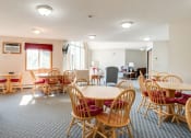 Thumbnail 8 of 9 - Community Room at Redwood Estates, Coon Rapids, MN, 55433