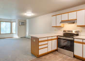 Thumbnail 4 of 9 - Kitchen with stainless steel appliances at Redwood Estates, Coon Rapids, Minnesota, 55433