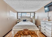 Thumbnail 5 of 13 - A unit at 500 Manila Senior Living Apartments with a  bedroom