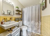 Thumbnail 8 of 13 - 500 Manila unit bathroom with a toilet and a shower and a sink