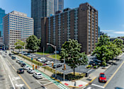Thumbnail 15 of 15 - an aerial view of a busy city street with cars and tall buildings