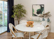Thumbnail 15 of 19 - Dining area with dining table and seating at Westridge Gardens