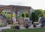 Thumbnail 29 of 29 - Outdoor Patio With Grills at Cedar Place Apartments, Cedarburg, WI, 53012