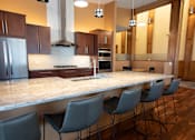 Thumbnail 11 of 29 - Granite Counter Tops In Kitchen at Cedar Place Apartments, Cedarburg